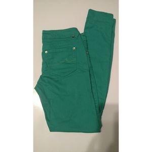 Almost Famous from the Buckle green skinny jeans